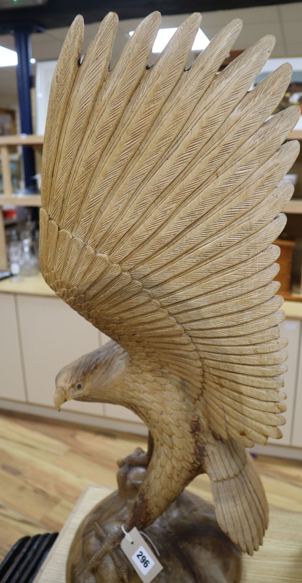 A contemporary carved wood model of a Golden Eagle